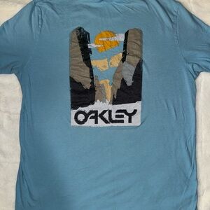 Oakley Vintage Y2K Men's Blue Tee with Graphic Design